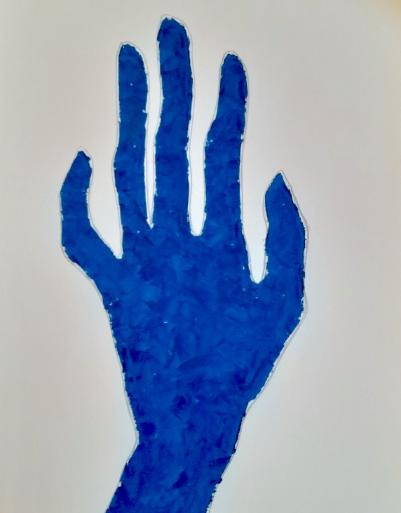 Blue hand by Amma Gyan the lady who paints hands at amanartis Watford by Amma Gyan