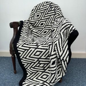 Geometric Lines – Hand crocheted wool blanket by Elizabeth Stewart designs