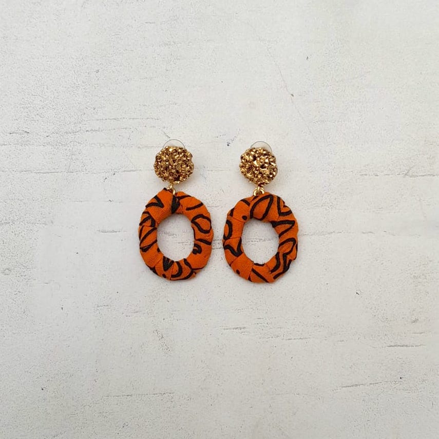 Orange and Black African fabric and brass earrings by Jumandy Fabrics at Amanartis at the Atria by Amma Gyan 1