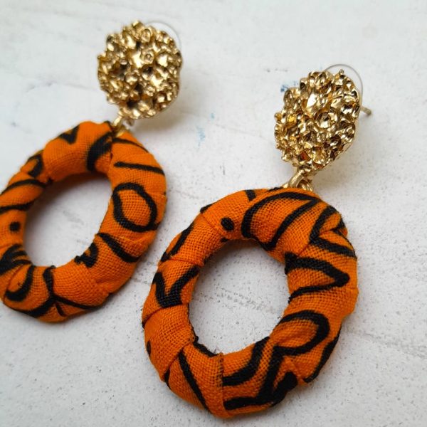Orange and Black African fabric and brass earrings by Jumandy Fabrics at Amanartis at the Atria by Amma Gyan 3