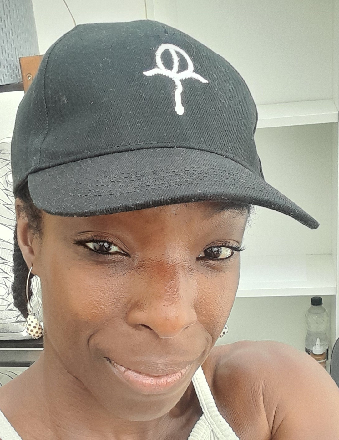 Amma Gyan in Gratitude cap at the house of Amma by Amma Gyan 6